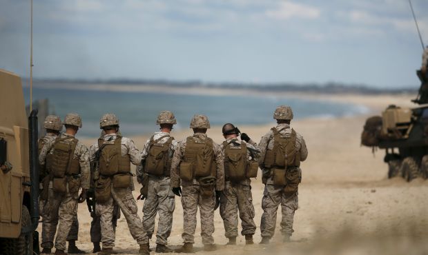 NATO soldiers attend a NATO military exercise at Raposa beach, near Setubal, Portugal October 20, 2015. NATO and its allies opened their largest military exercise in more than a decade on Monday, choosing the central Mediterranean to showcase strengths that face threats from Russia's growing military presence from the Baltics to Syria.  REUTERS/Rafael Marchante